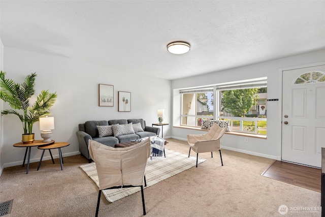 7475 Trica Ave, Bremerton, WA 98311 - living room featuring carpet and baseboards