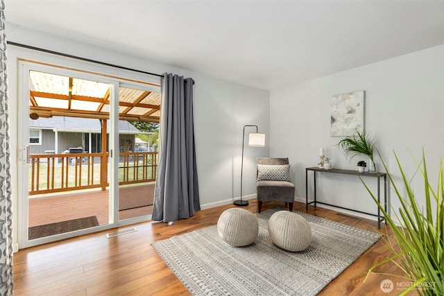 7475 Trica Ave, Bremerton, WA 98311 - sitting room with wood finished floors and baseboards