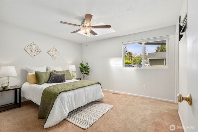 7475 Trica Ave, Bremerton, WA 98311 - bedroom with light carpet, baseboards, and a ceiling fan