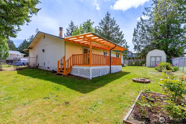 7475 Trica Ave, Bremerton, WA 98311 - rear view of house with a fire pit, crawl space, and a deck