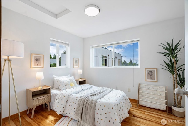 6348 34th Ave SW Unit C, Seattle, WA 98126 - bedroom with wood finished floors and baseboards