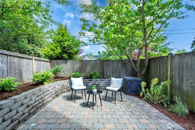 6348 34th Ave SW Unit C, Seattle, WA 98126 - fenced backyard with a patio