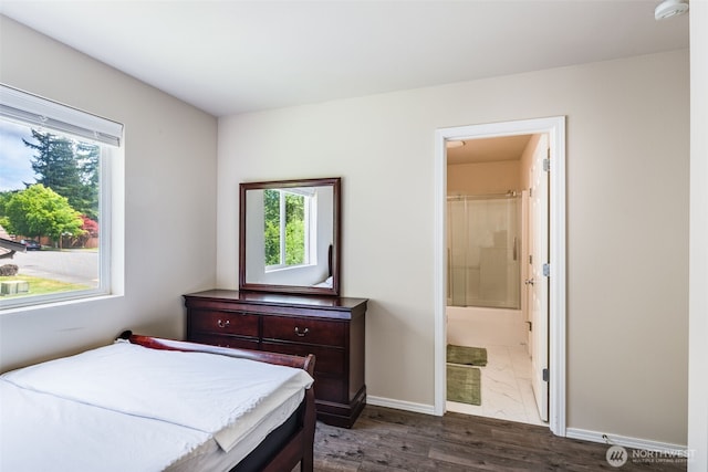 11710 SE 310th St, Auburn, WA 98092 - bedroom with dark wood-style floors, baseboards, and ensuite bathroom