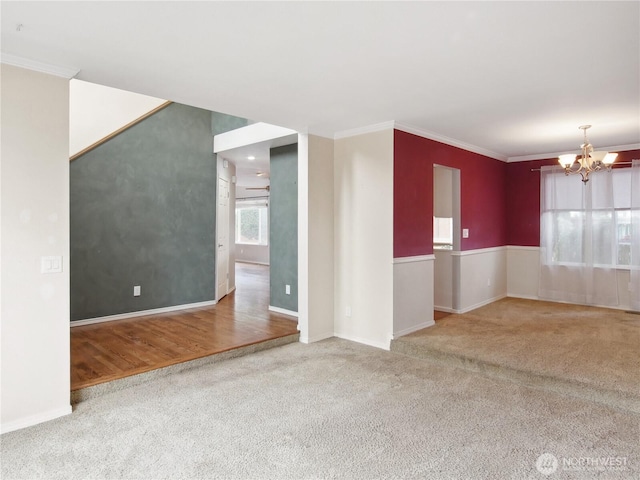 1015 SW 348th Pl, Federal Way, WA 98023 - carpeted spare room featuring a chandelier, ornamental molding, and baseboards