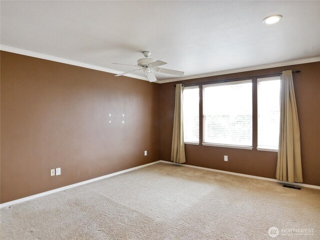 1015 SW 348th Pl, Federal Way, WA 98023 - carpeted empty room with ornamental molding, baseboards, and a ceiling fan