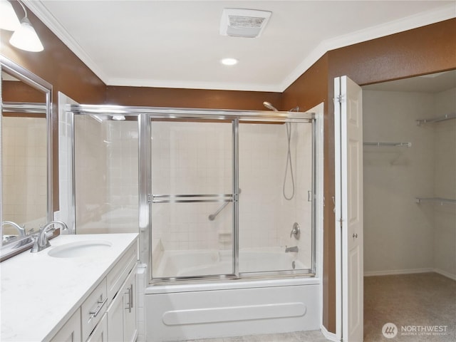 1015 SW 348th Pl, Federal Way, WA 98023 - full bathroom featuring vanity, enclosed tub / shower combo, ornamental molding, a walk in closet, and recessed lighting