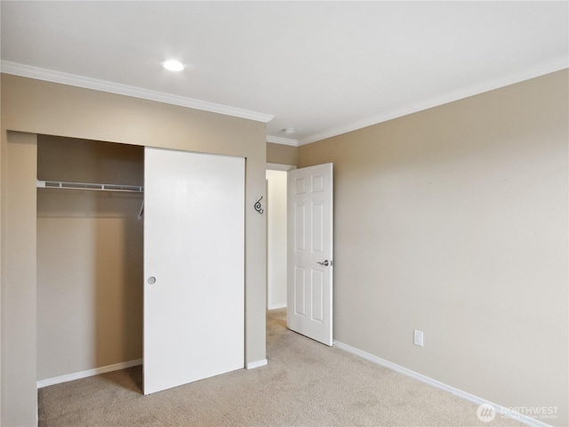 1015 SW 348th Pl, Federal Way, WA 98023 - unfurnished bedroom featuring light colored carpet, a closet, ornamental molding, and baseboards