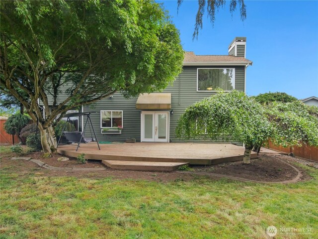 1015 SW 348th Pl, Federal Way, WA 98023 - back of house with a wooden deck, a chimney, and french doors