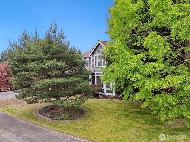 1015 SW 348th Pl, Federal Way, WA 98023 - view of property exterior featuring a lawn