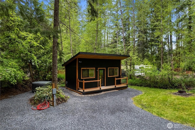 34208 343rd Avenue Ct E, Ashford, WA 98304 - view of outdoor structure featuring a wooded view