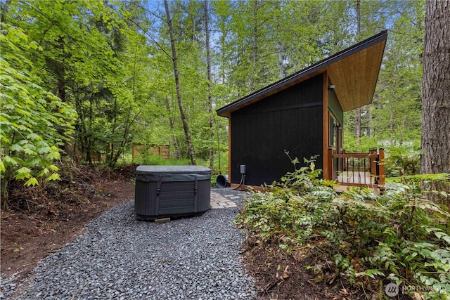 34208 343rd Avenue Ct E, Ashford, WA 98304 - view of yard with a hot tub and a view of trees