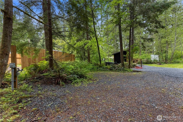 34208 343rd Avenue Ct E, Ashford, WA 98304 - view of front of house with a wooded view