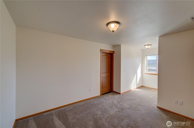 46 Wildwood Ln, Cathlamet, WA 98612 - spare room featuring carpet flooring and baseboards
