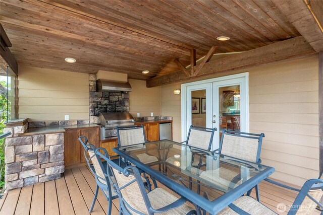 2570 Island View Ln, Lummi Island, WA 98262 - wooden deck with outdoor dining area and french doors