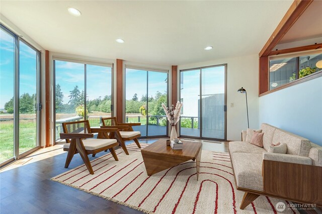 2877 N Nugent Rd N Unit M3, Lummi Island, WA 98262 - living area featuring expansive windows, wood finished floors, and recessed lighting