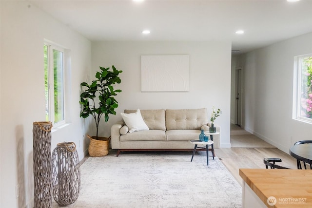 3333 228th St Unit 42, Bothell, WA 98021 - living room featuring recessed lighting, wood finished floors, and baseboards