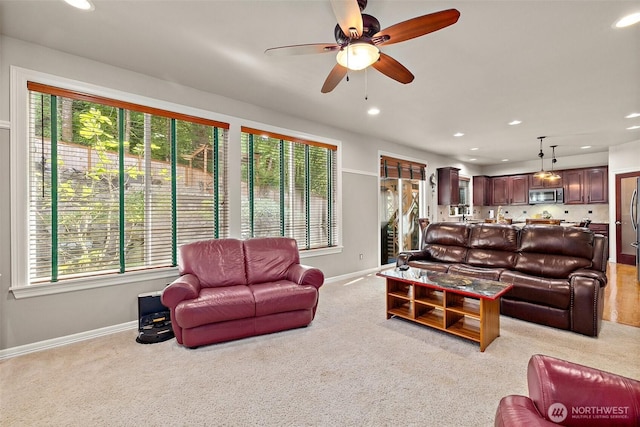 12153 SE 307th Pl, Auburn, WA 98092 - living area featuring baseboards, healthy amount of natural light, light carpet, recessed lighting, and ceiling fan