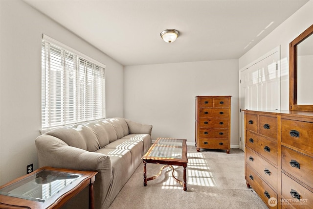 12153 SE 307th Pl, Auburn, WA 98092 - living room featuring light carpet and baseboards