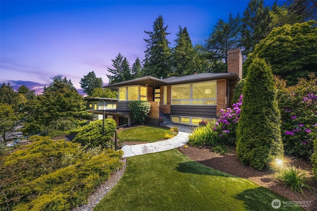 1309 NW Norcross Way, Seattle, WA 98177 - view of front of house featuring a chimney and a front lawn