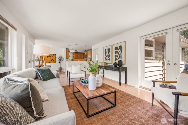 1309 NW Norcross Way, Seattle, WA 98177 - living room with light wood-type flooring and french doors
