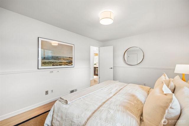 1309 NW Norcross Way, Seattle, WA 98177 - bedroom with wood finished floors and baseboards