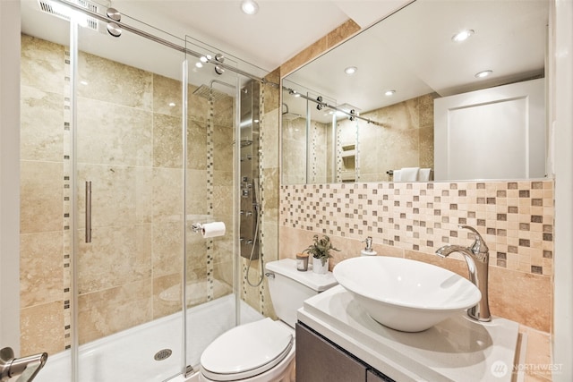 1309 NW Norcross Way, Seattle, WA 98177 - bathroom with a stall shower, recessed lighting, toilet, vanity, and tile walls