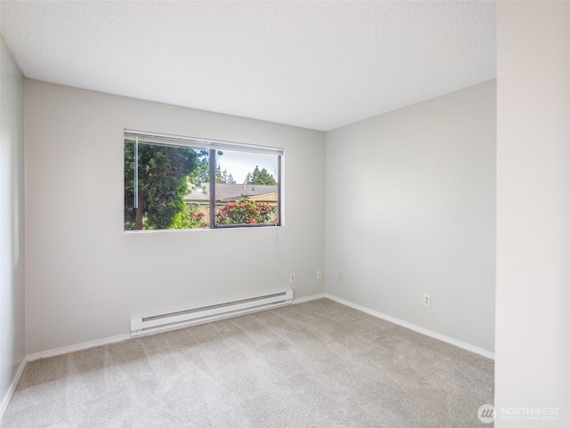 821 Essex Pl NE Unit 1-B, Lacey, WA 98516 - carpeted empty room with baseboard heating and baseboards