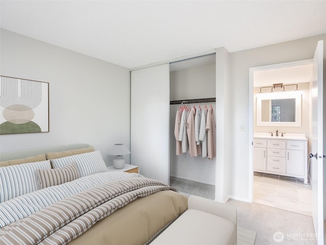 821 Essex Pl NE Unit 1-B, Lacey, WA 98516 - bedroom featuring light colored carpet, a sink, a closet, and ensuite bathroom
