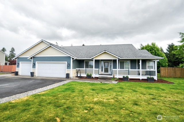 17639 Dusty Ct SW, Tenino, WA 98589 - view of front facade featuring a porch, asphalt driveway, an attached garage, and roof with shingles