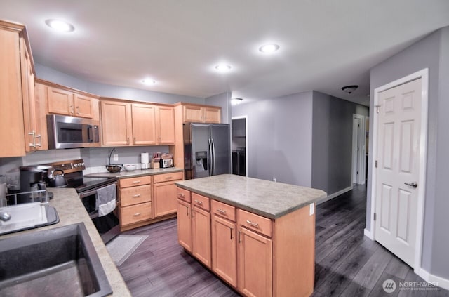 17639 Dusty Ct SW, Tenino, WA 98589 - kitchen featuring appliances with stainless steel finishes, light brown cabinets, a sink, and recessed lighting