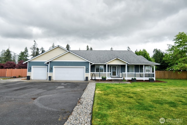 17639 Dusty Ct SW, Tenino, WA 98589 - view of front of house featuring a porch, an attached garage, driveway, and a shingled roof