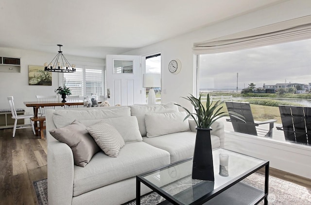 3596 Shell St, Greenbank, WA 98253 - living area featuring wood finished floors and a chandelier