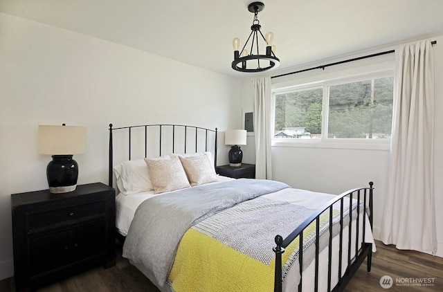 3596 Shell St, Greenbank, WA 98253 - bedroom featuring dark wood-type flooring and a chandelier