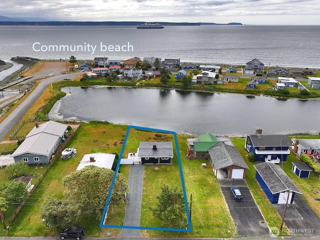 3596 Shell St, Greenbank, WA 98253 - aerial view of residential area with property parcel outlined and a large body of water