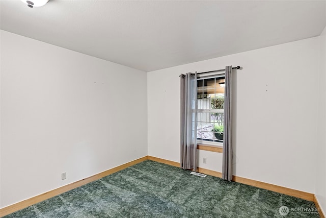 20460 Noll Rd NE, Poulsbo, WA 98370 - carpeted spare room featuring baseboards