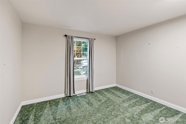 20460 Noll Rd NE, Poulsbo, WA 98370 - empty room with dark colored carpet and baseboards