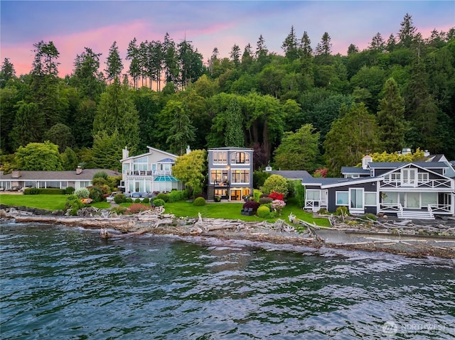 4864 Rockaway Beach Rd NE, Bainbridge Island, WA 98110 - water view with a heavily wooded area