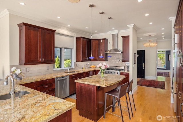 4864 Rockaway Beach Rd NE, Bainbridge Island, WA 98110 - kitchen with wall chimney range hood, stainless steel appliances, a sink, recessed lighting, and light stone counters