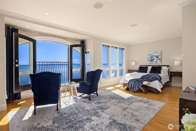 4864 Rockaway Beach Rd NE, Bainbridge Island, WA 98110 - bedroom with light wood-type flooring, crown molding, recessed lighting, and baseboards
