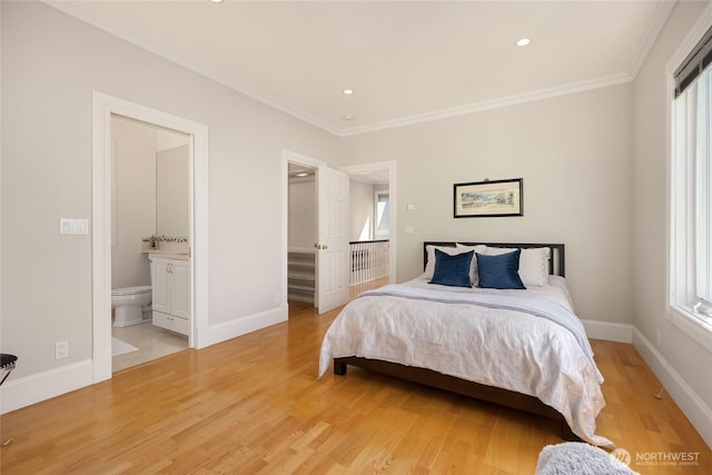4864 Rockaway Beach Rd NE, Bainbridge Island, WA 98110 - bedroom with multiple windows, light wood-style flooring, ornamental molding, baseboards, and recessed lighting