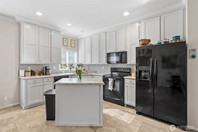 20318 E 67th Ave E, Spanaway, WA 98387 - kitchen featuring black appliances, ornamental molding, decorative backsplash, white cabinetry, and a center island