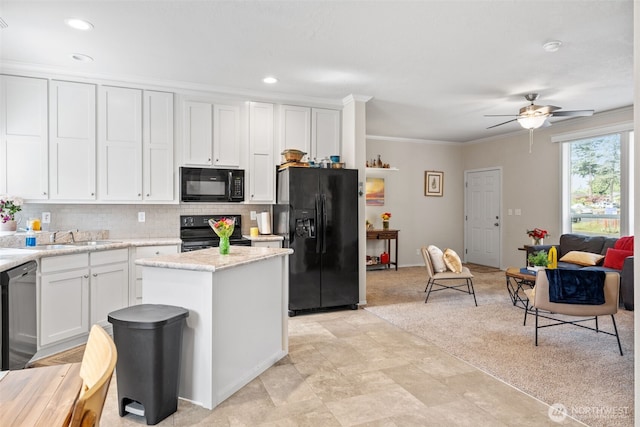20318 E 67th Ave E, Spanaway, WA 98387 - kitchen featuring black appliances, a sink, ceiling fan, white cabinetry, and crown molding
