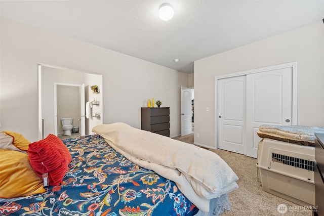 20318 E 67th Ave E, Spanaway, WA 98387 - bedroom with carpet flooring, a closet, and ensuite bathroom