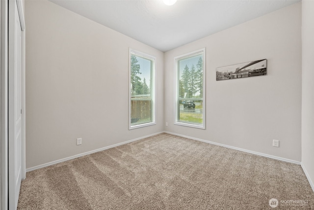 20318 E 67th Ave E, Spanaway, WA 98387 - carpeted spare room featuring baseboards