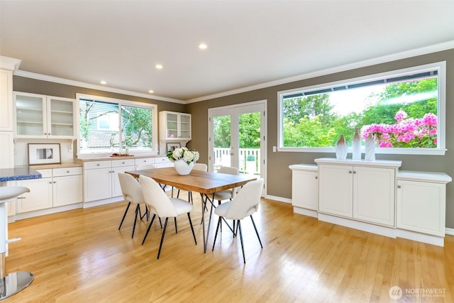 11633 132nd Ct NE, Redmond, WA 98052 - dining room featuring light wood-type flooring, ornamental molding, healthy amount of natural light, recessed lighting, and french doors