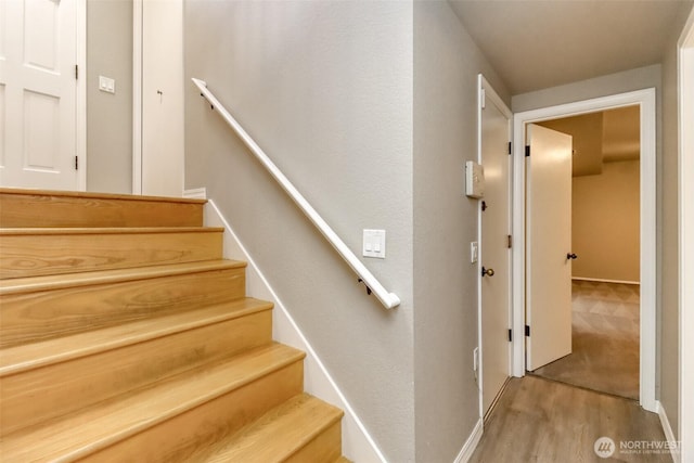 11633 132nd Ct NE, Redmond, WA 98052 - staircase featuring wood finished floors and baseboards