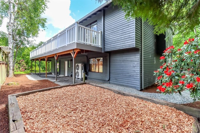 11633 132nd Ct NE, Redmond, WA 98052 - rear view of property with a deck and a patio