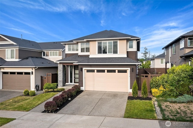 5614 Douglas Ave SE, Auburn, WA 98092 - view of front facade with driveway, an attached garage, and roof with shingles