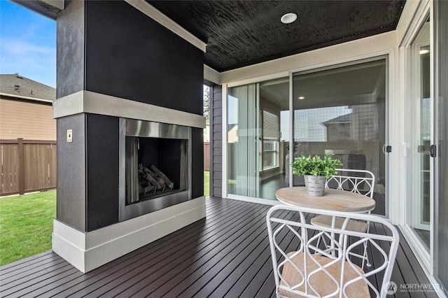 5614 Douglas Ave SE, Auburn, WA 98092 - wooden terrace with exterior fireplace