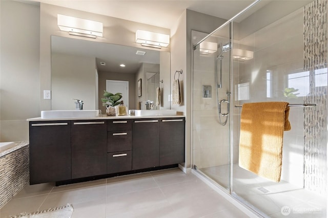 5614 Douglas Ave SE, Auburn, WA 98092 - bathroom featuring double vanity, a shower stall, tile patterned floors, and a relaxing tiled tub